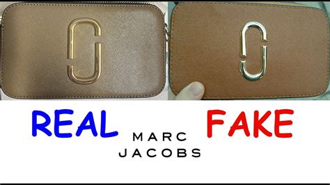 Real vs Fake Marc Jacobs camera bag. How to spot fake Marc 